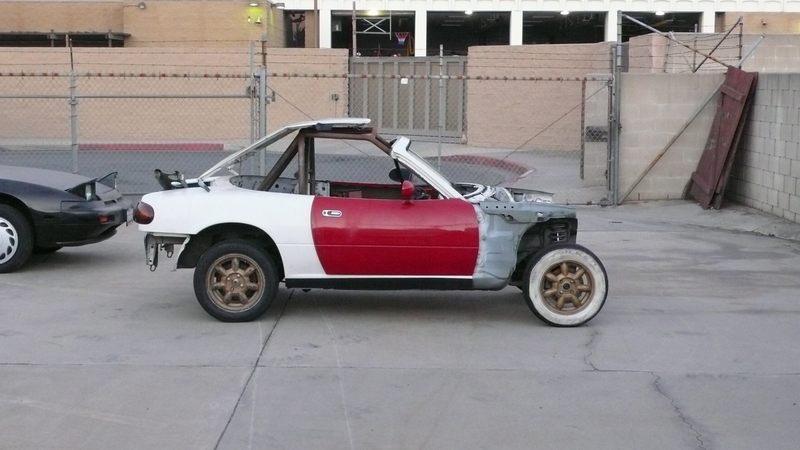 Illustration for article titled Eyesore Racing's Ghettocharged Miata Fears No Turbocharged Peugeot Surrender Monkeys!